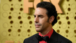 Private security helps Sacha Baron Cohen escape angry gun owners in a behind-the-scenes <i>Borat 2 </i>clip